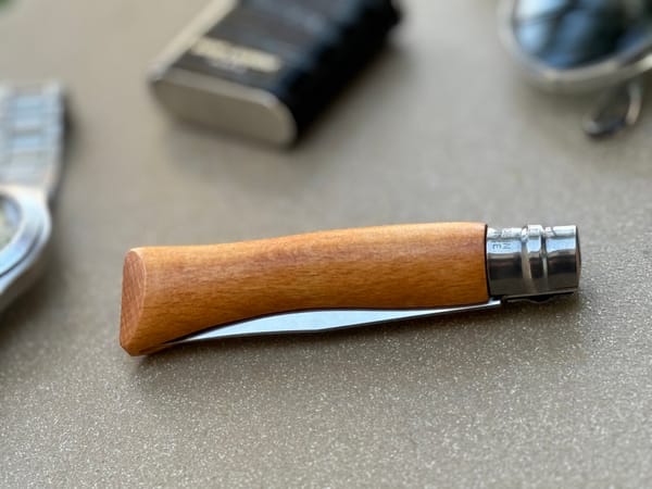 an image of a wood handled opinel pocket knife