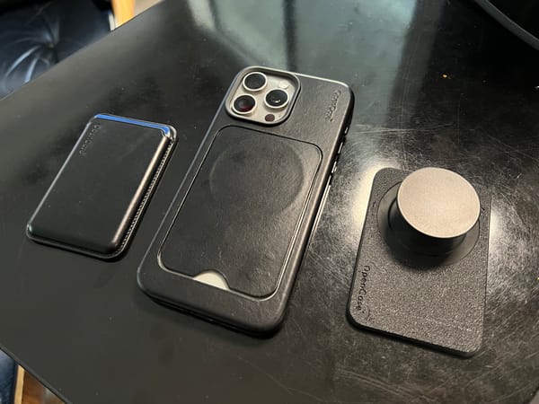 opencase wallet, case with filler plate and popcase accessory on a table